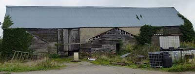 A timber barn frame barn for sale