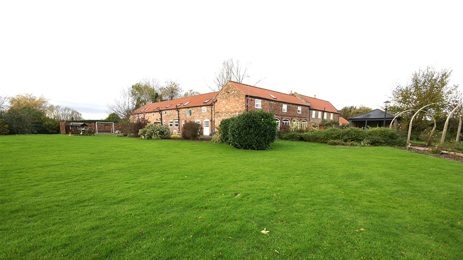 Coach house conversion set in an acre of land in Molescroft, Beverley